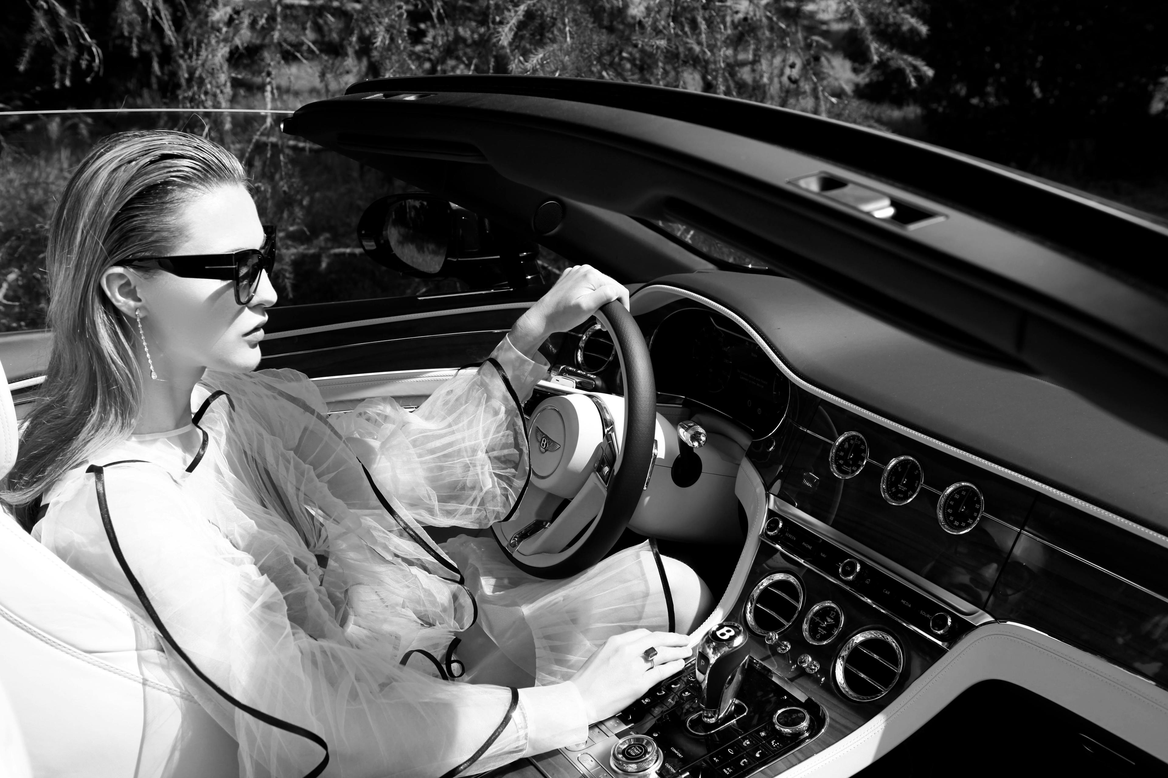 person human car automobile transportation vehicle sunglasses accessories accessory convertible