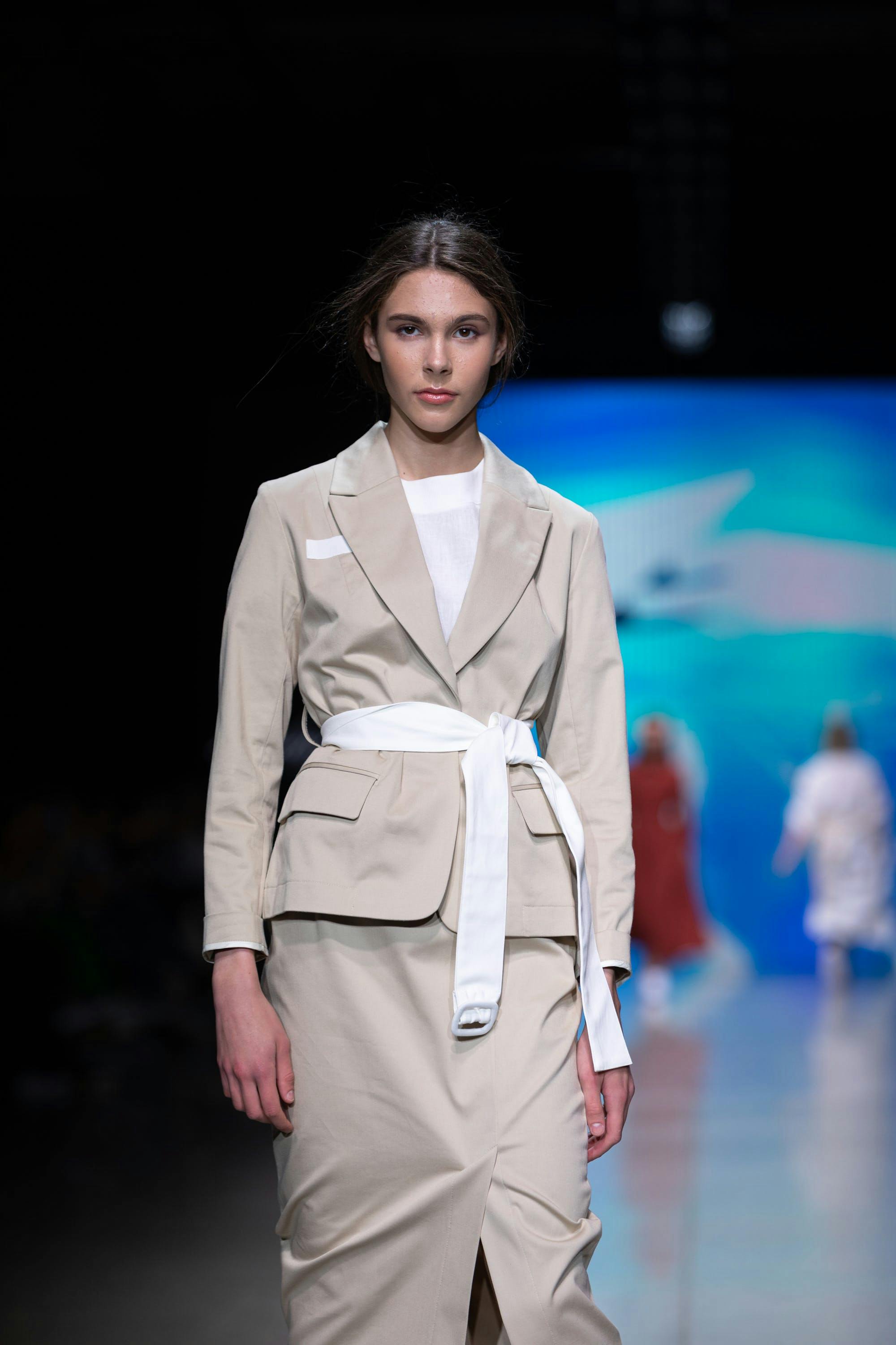 clothing apparel person human overcoat coat fashion