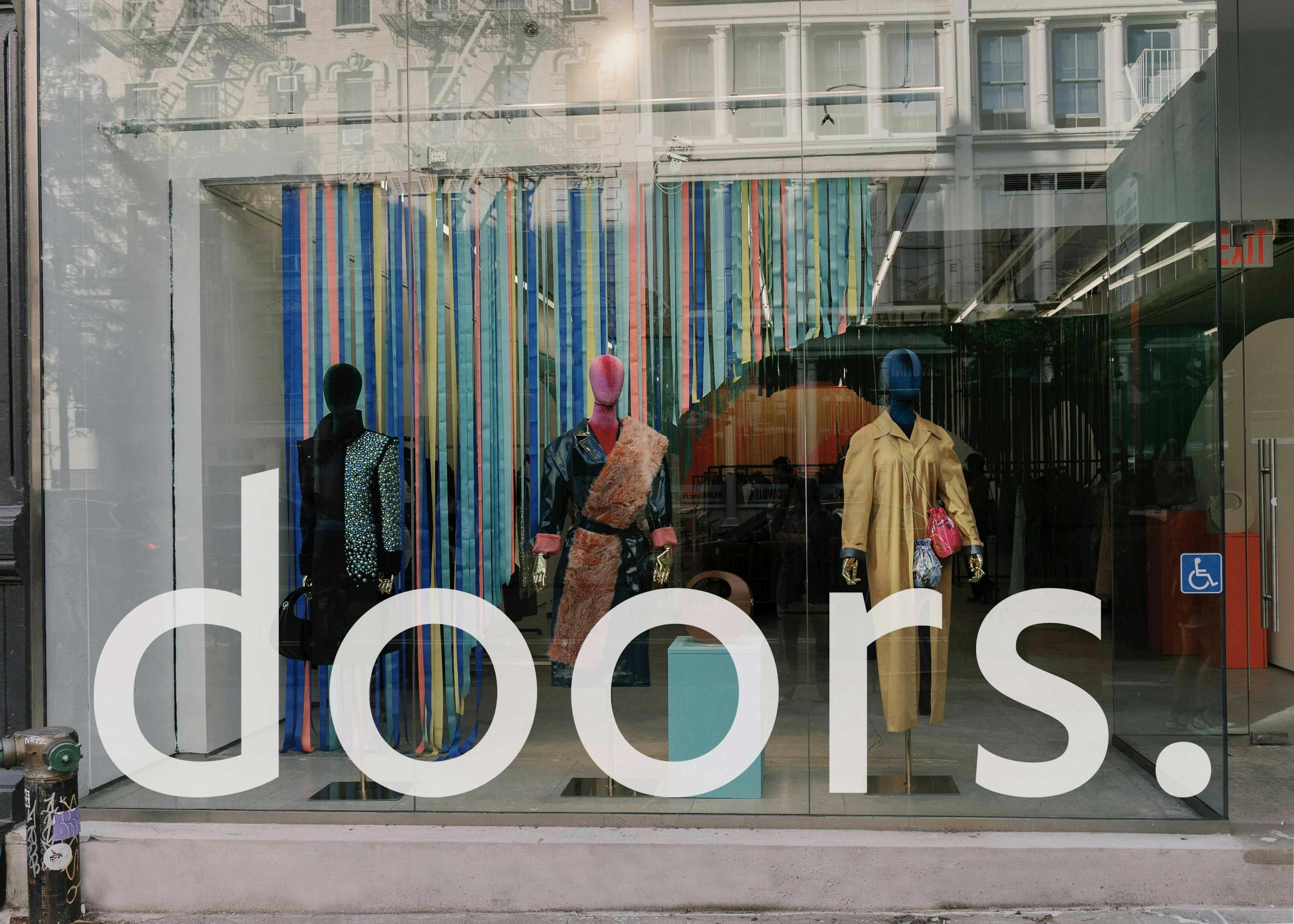 clothing apparel person human shop window display overcoat coat