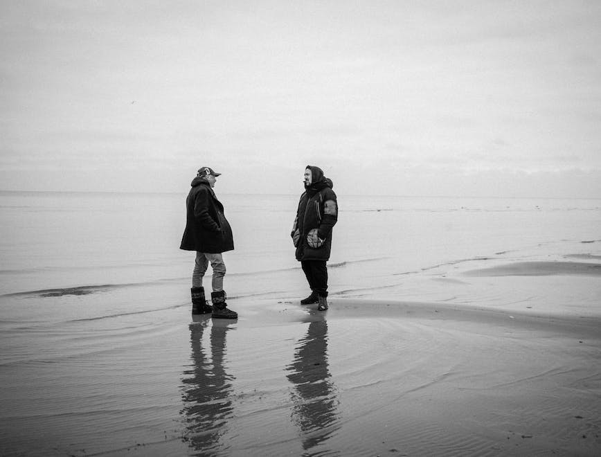 coat walking person photography beach sea nature outdoors glove shoe