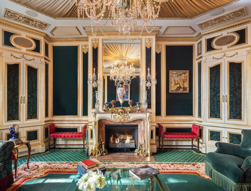 10 east 64th street family home ivana trump new york city ornate townhouse traditional upper east side home decor reception room waiting room indoors living room furniture interior design chandelier fireplace couch
