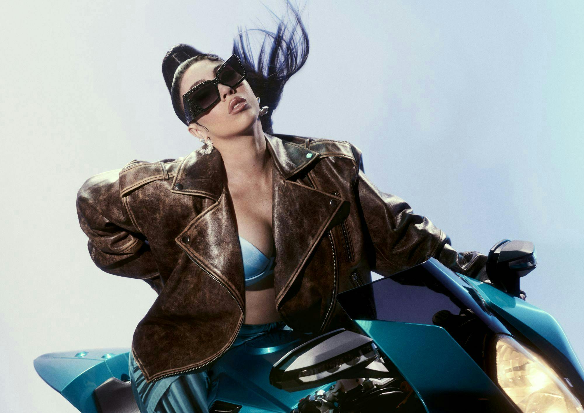 clothing coat jacket adult female person woman accessories sunglasses portrait