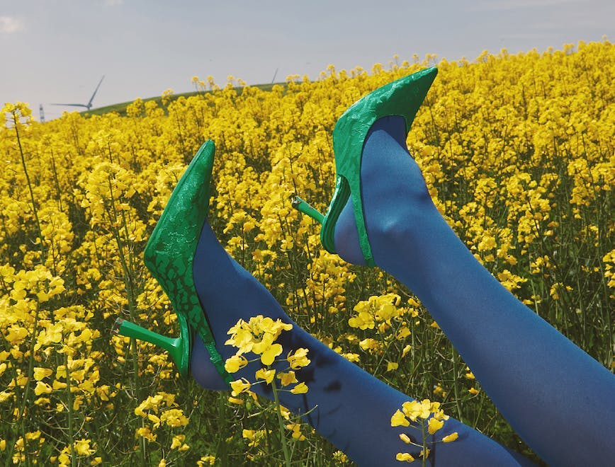 footwear shoe field grassland outdoors high heel meadow rural flower person