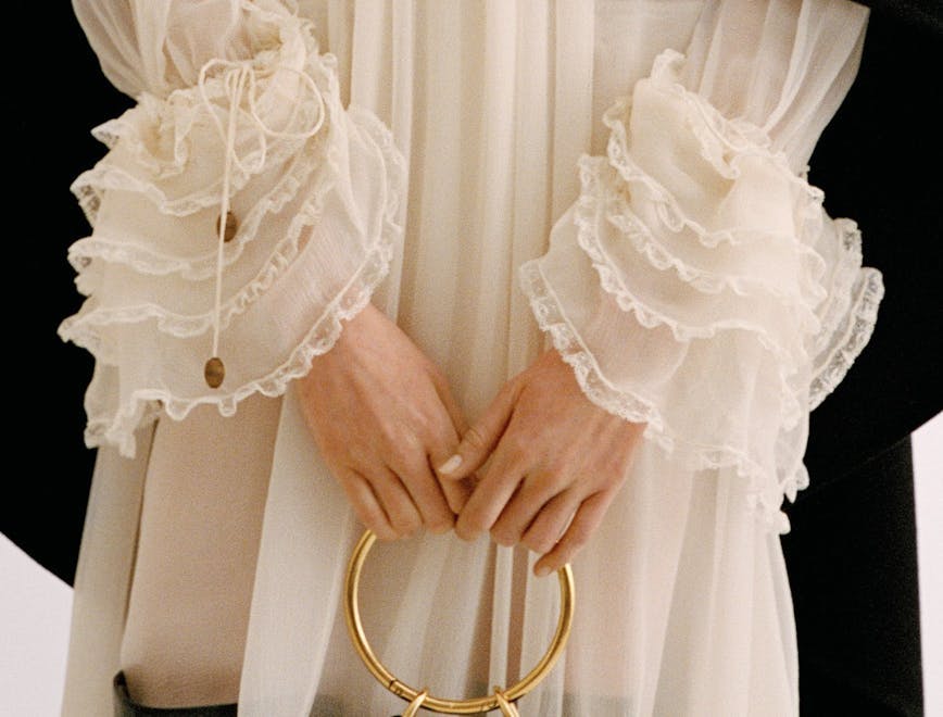 accessories bag handbag blouse clothing purse bridal veil person wedding wedding gown